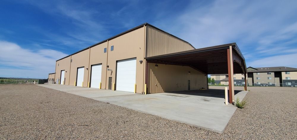 Functional +/-18,000+ SQ FT Shop on 3.11 Acres in Glendive, MT: 123 W Oregon Ln, Glendive, MT 59330